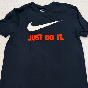 Nike Black Tee with White Swoosh and Orange Text
